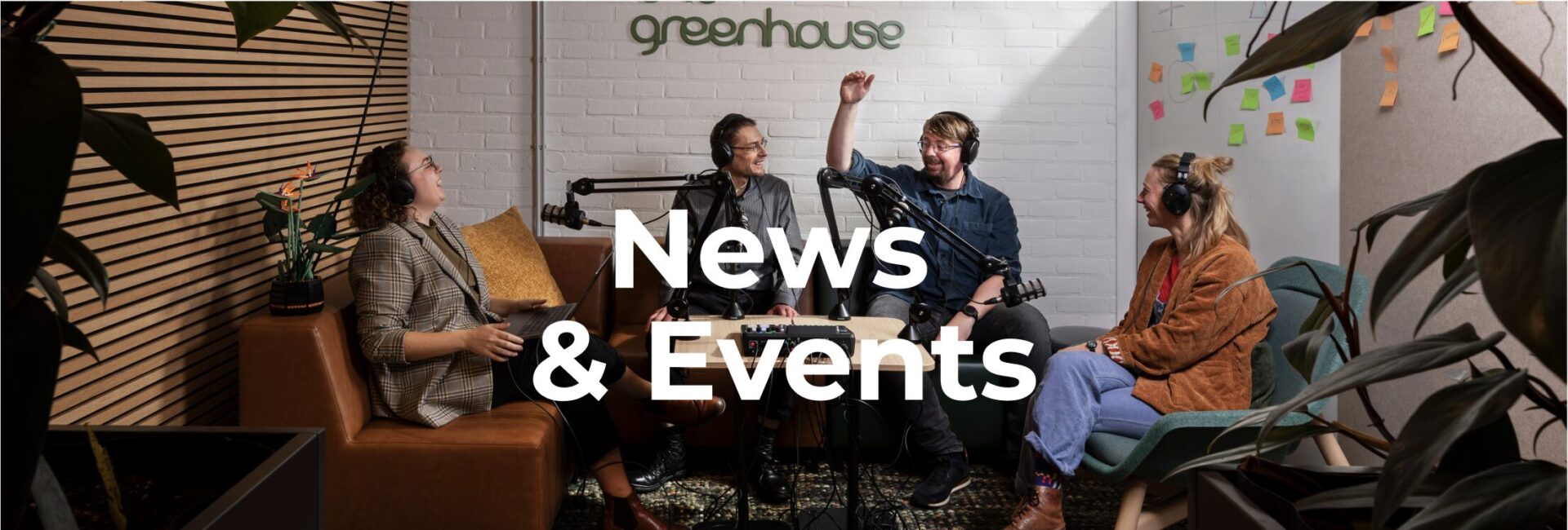 Four people sit at a podcast booth with the title 'News & Events' overtop